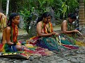 Girls Weaving in Traditional Garb