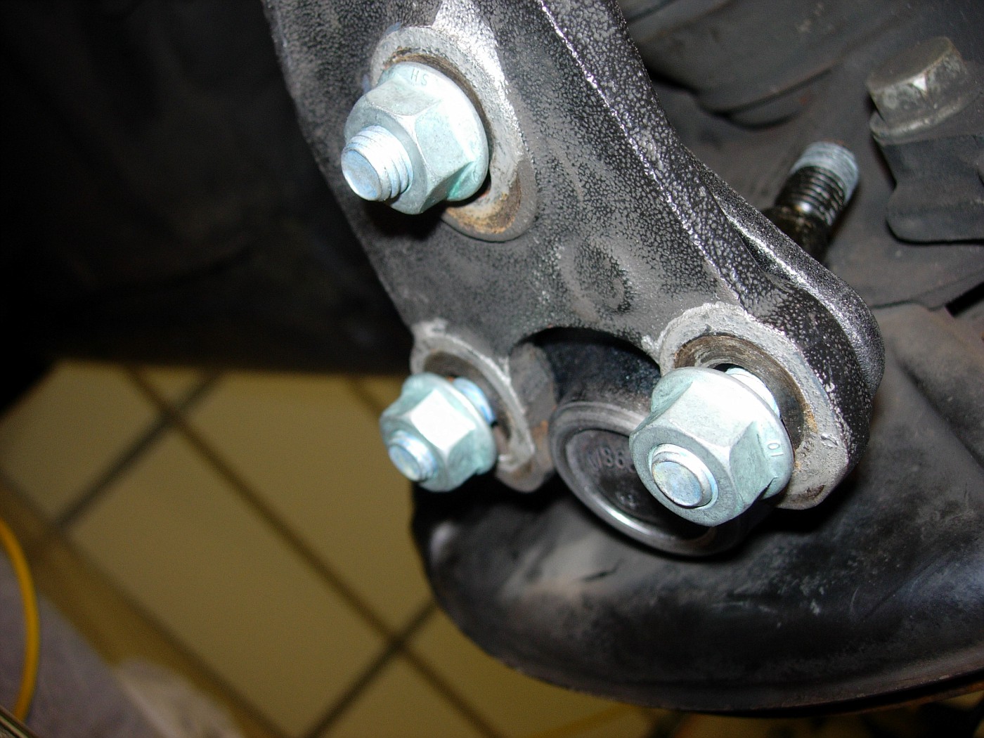 Photo 16 mm hex nuts hold ball joint to control arm Ball Joint