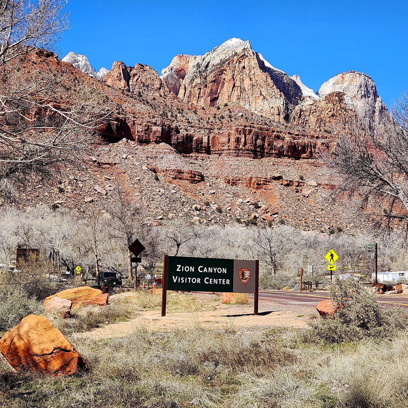 Photo Sign Visible Upon Exiting the Visitor Center Parking Area at 5